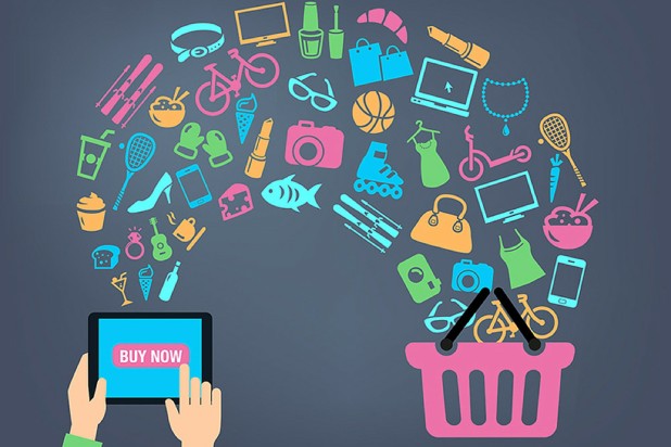 Person holding tablet and items transferring into online shopping cart – 2015 ecommerce trends and tips