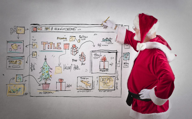 Santa Clause working on white board – selling tips and strategies for online businesses to increase sales.