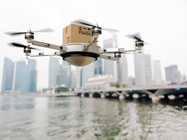 A delivery drone carrying a package.