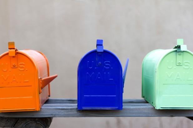 Orange blue and green mailboxes