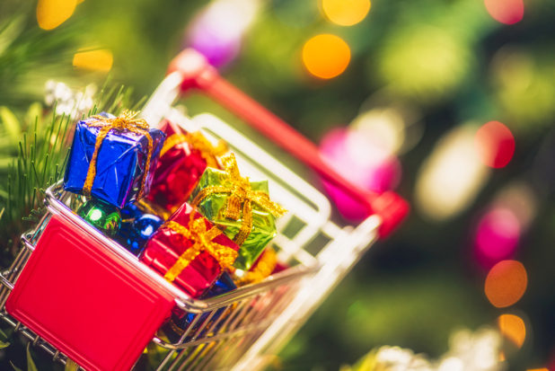 shopping cart full of holiday gifts