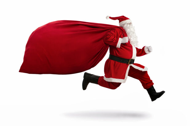Santa Claus on the run to deliver last-minute holiday gifts