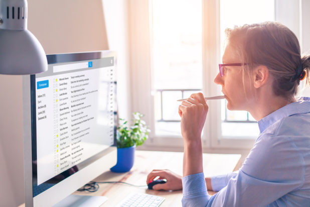 Woman conducting email audit